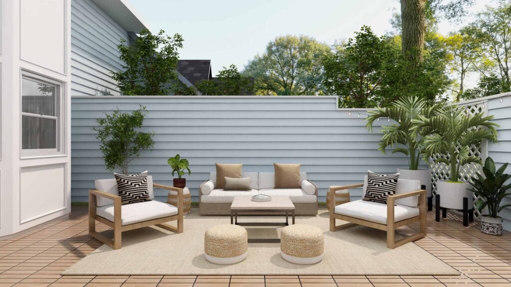 Light Blue Horizontal Siding Patio Light blue horizontal siding fence and home exterior with wood deck patio, seating area, and potted plants