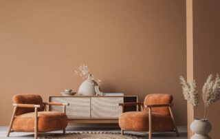 Warm tan-painted interior wall with natural light and shadow gradations in modern residential room.